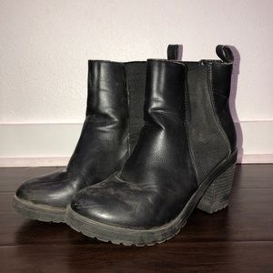 Heeled black booties